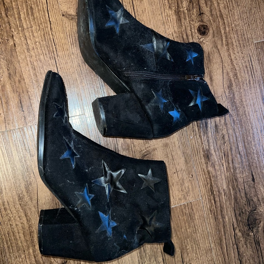 black suede heeled booties with star pattern